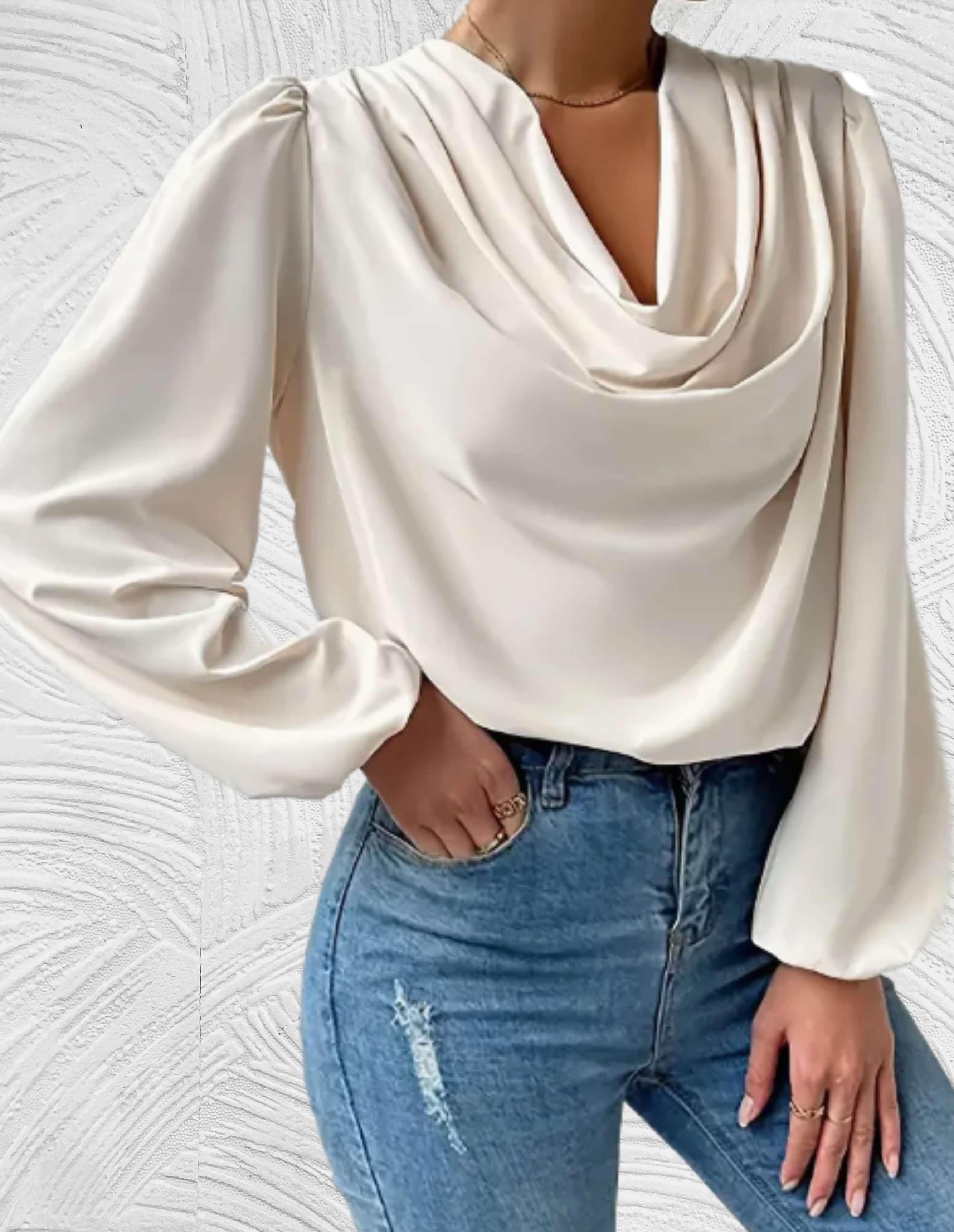 Witte top met lange pofmouwen en omslagmotieven