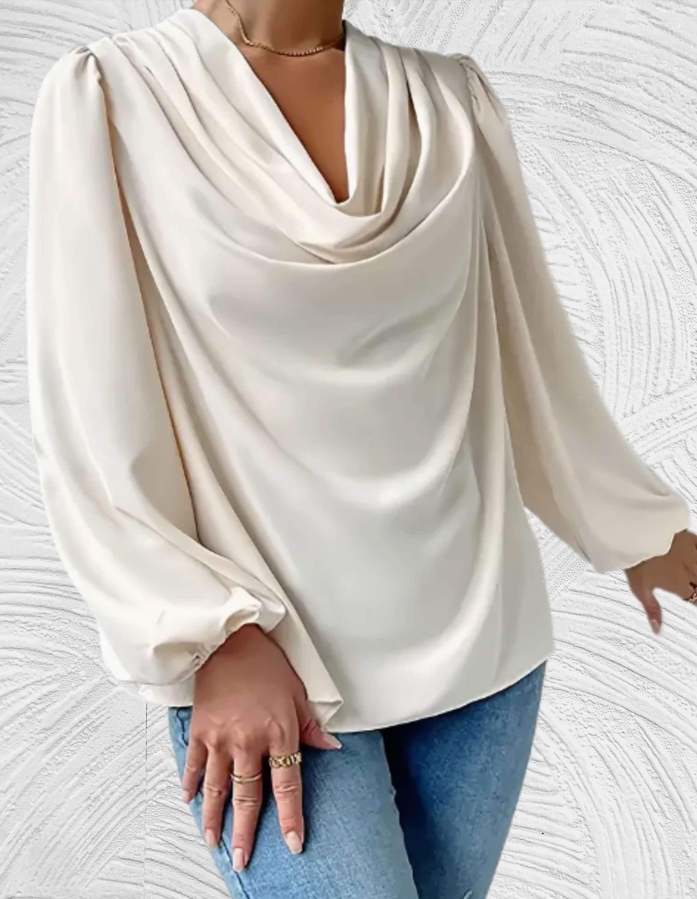 Witte top met lange pofmouwen en omslagmotieven