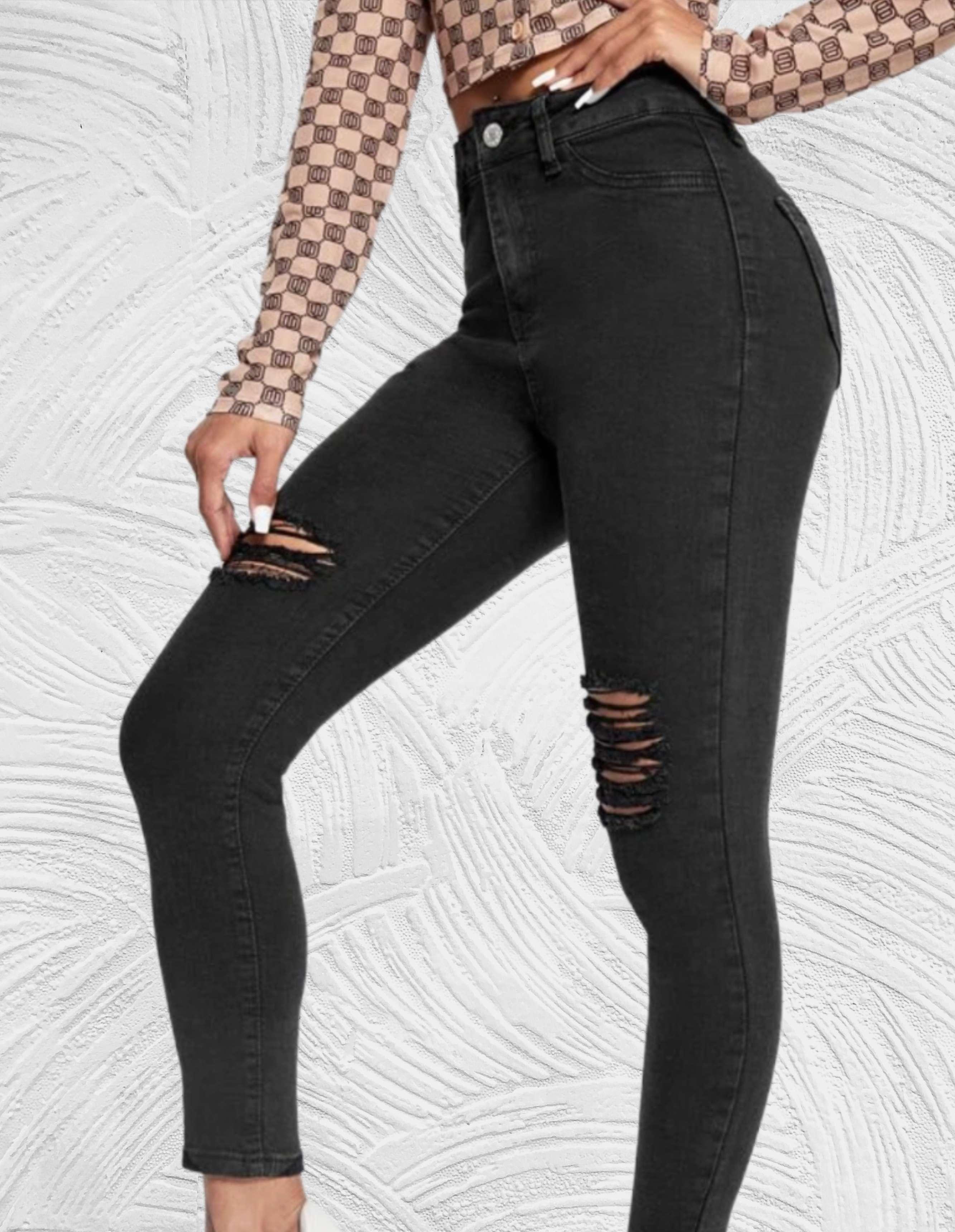 Strakke jeans met hoge taille en gescheurd ontwerp