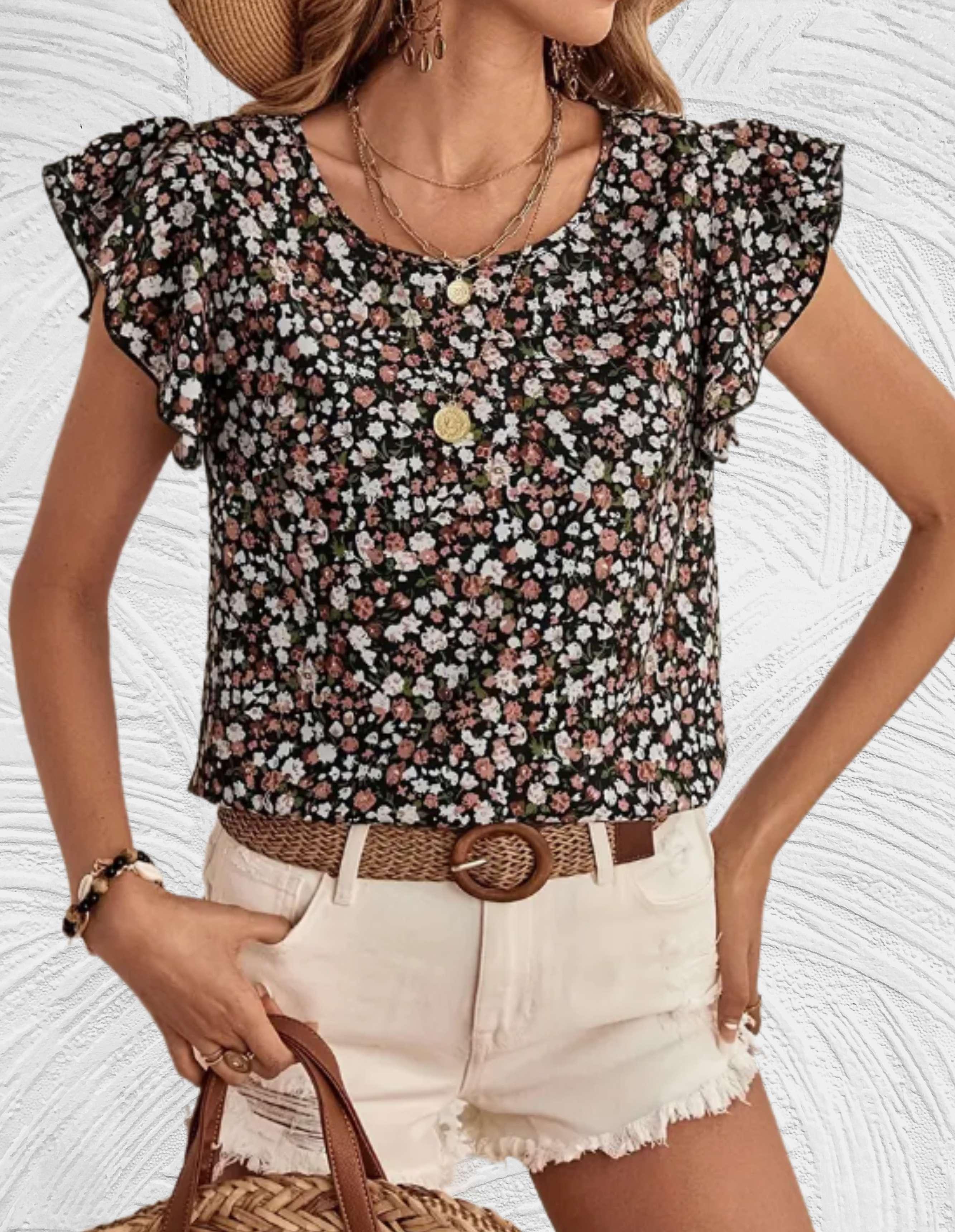 Top met halve ruches en ronde hals met witte stippenprint